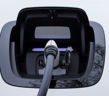 socket-electric-car-with-plugged-charger